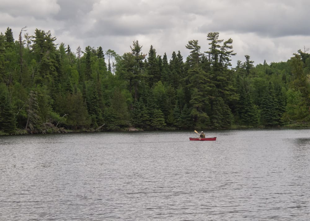hunt lake trail red canoe on lake